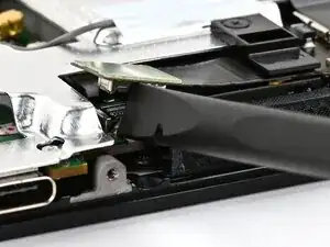 Снятие считывателя карты MicroSD в Nintendo Switch 2