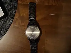 Замена батарейки в часах Van Heusen PC21J