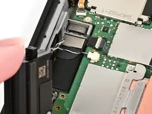 Установка правого динамика Nintendo Switch 2