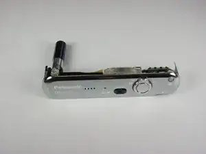 Замена верхнего узла вспышки Panasonic Lumix DMC-FX01
