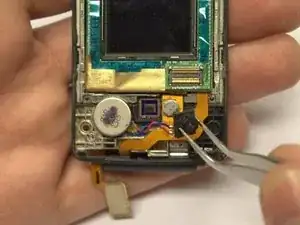 Замена объектива камеры устройства LG CU515 SKU 64743